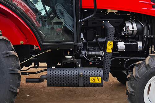 Silenciador bajo el chasis